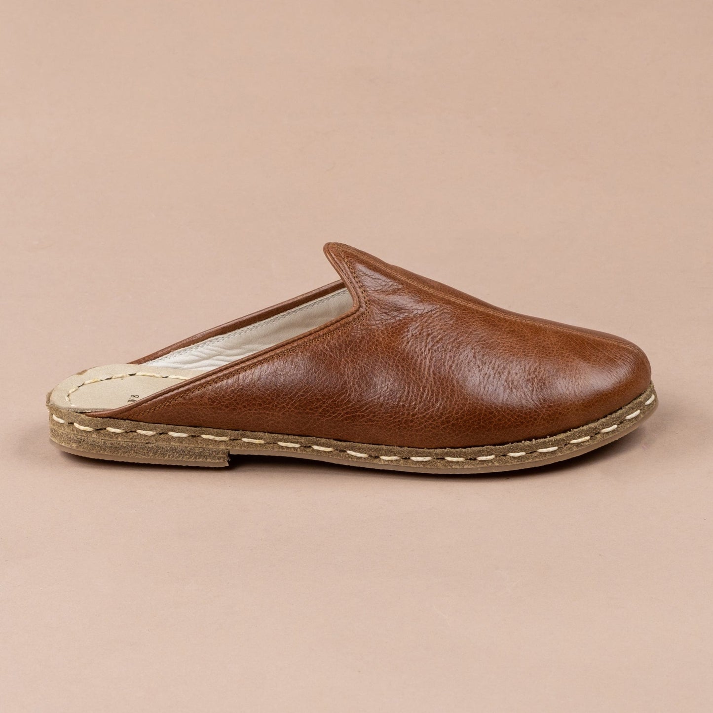 Pantuflas marrones antiguas para hombre