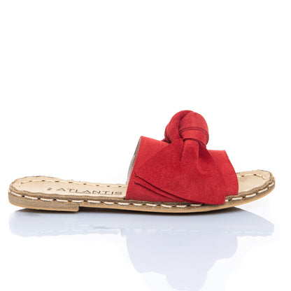 Sandalias de piel con lazos rojos