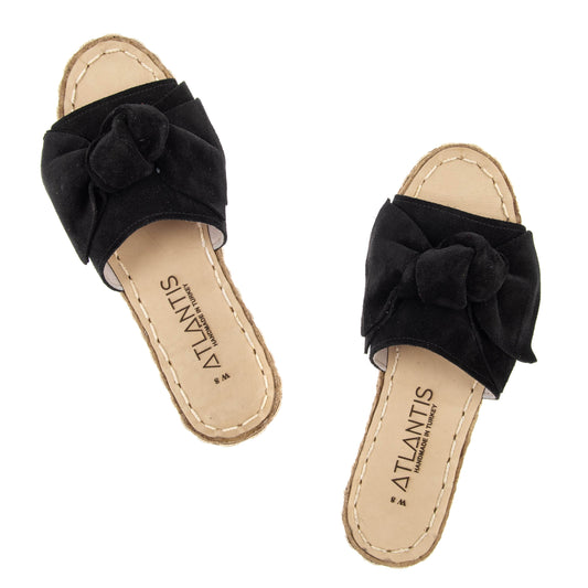 Sandalias de piel con lazos negros