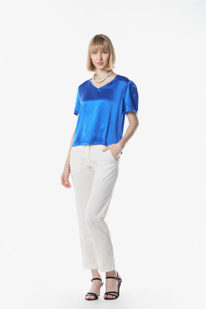 Blusa con escote en V brillante en color azul