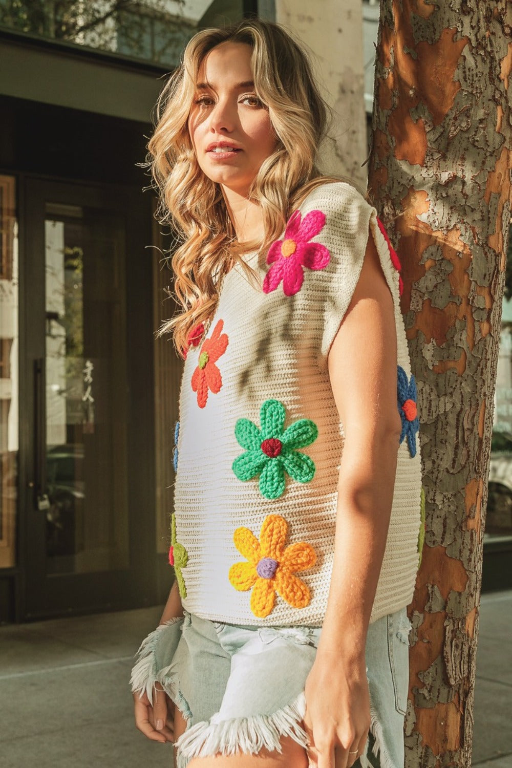 Blusa de punto con cuello redondo y mangas cortas con flores BiBi