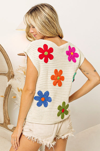 Blusa de punto con cuello redondo y mangas cortas con flores BiBi